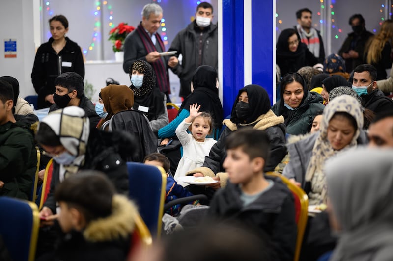 Refugees from Afghanistan in London. The UK Home Office says it has permanently housed 6,000 people but between 6,000 and 9,000 are still living in bridging hotels. Getty Images
