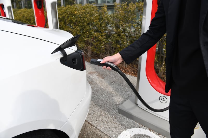 One challenge the electric vehicle industry faces is the infrastructure needed to increase the number of charging stations available to the public. Bloomberg