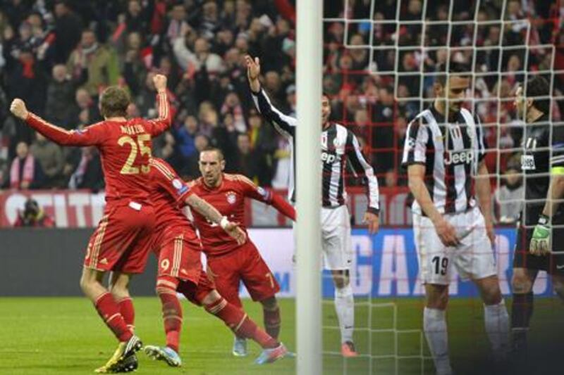 Thomas Mueller celebrates his goal for Barcelona against Juventus in the Champions League quarter final.