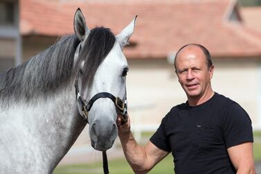 Ernst Oertel with AF Al Sajanjle, who will race in the Dubai Kahayla Classic on Dubai World Cup night. Erika Rasmussen for The National