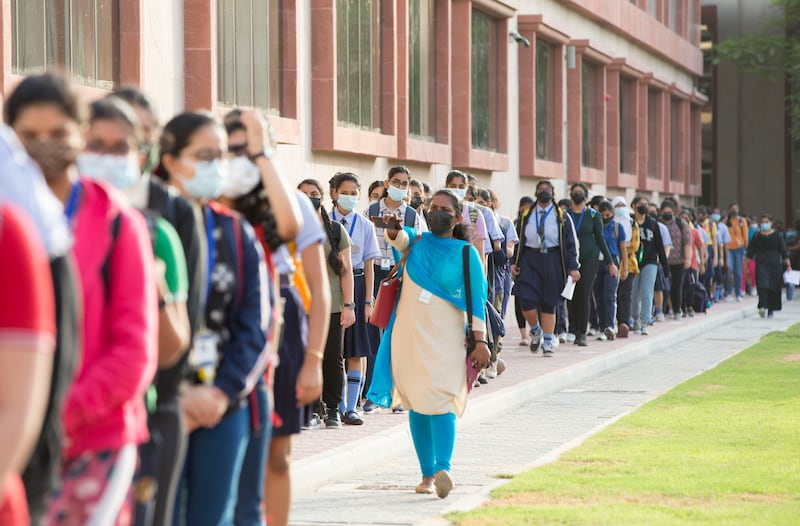 Pupils queuing to enter their classrooms on the first day of in-person learning at the Indian High School in Oud Metha, Dubai.