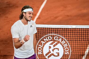 Stefanos Tsitsipas celebrates after beating Russia's Daniil Medvedev during their quarter-final match at the French Open. AFP