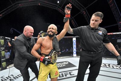 ABU DHABI, UNITED ARAB EMIRATES - JULY 19: Deiveson Figueiredo of Brazil celebrates after defeating Joseph Benavidez in their UFC flyweight championship bout during the UFC Fight Night event inside Flash Forum on UFC Fight Island on July 19, 2020 in Yas Island, Abu Dhabi, United Arab Emirates. (Photo by Jeff Bottari/Zuffa LLC via Getty Images) *** Local Caption *** ABU DHABI, UNITED ARAB EMIRATES - JULY 19: Deiveson Figueiredo of Brazil celebrates after defeating Joseph Benavidez in their UFC flyweight championship bout during the UFC Fight Night event inside Flash Forum on UFC Fight Island on July 19, 2020 in Yas Island, Abu Dhabi, United Arab Emirates. (Photo by Jeff Bottari/Zuffa LLC via Getty Images)