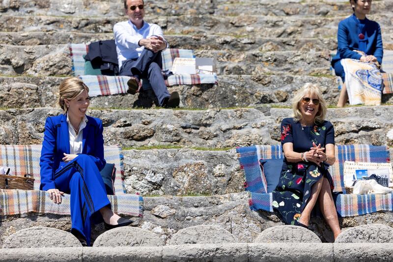 Porthcurno, United Kingdom. Prime Ministers wife Carrie Johnson talks with US First Lady Dr Jill Biden as they watch a performance of ‘Ocean World’ at the Minack Theatre. Photo: Simon Dawson / No 10 Downing Street
