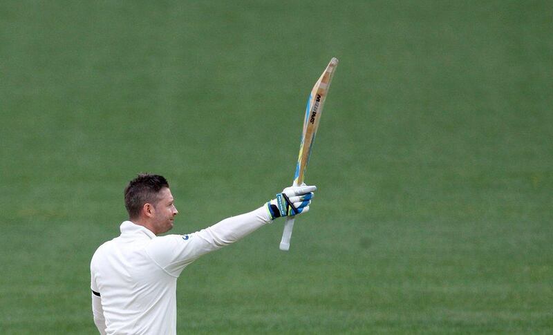 Australia's Michael Clarke celebrates making a century during Day 2 of the first Test against India in Adelaide on Wednesday. James Eslby/ AP / December 10, 2014 