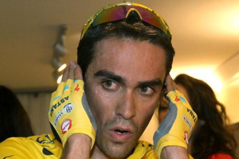 FILE - In this Aug. 3, 2010 file photo, Spanish cyclist  Alberto Contador reacts  in Castillon-la-Bataille, southwestern France. The Spanish cycling federation announced Monday Feb. 6, 2012 that CAS has banned Contador for two years for doping. The court of a Arbitration for Sport delivered the verdict Monday, 17 months after Contador returned a positive drug test in winning the 2010 Tour de France race. Contador has always claimed the positive result was from contaminated beef he eat during the race. (AP Photo/Bob Edme, File) *** Local Caption ***  Spain Cycling Contador Doping.JPEG-09e61.jpg