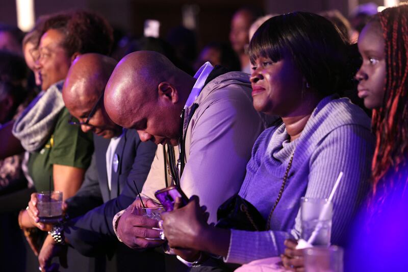 Audience members at an election night watch party for Mr Warnock at the Marriott Marquis in Atlanta. Getty / AFP