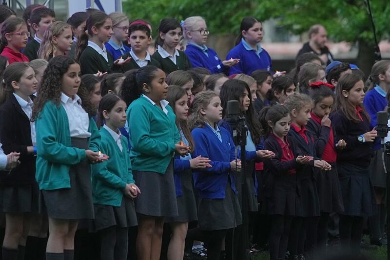 Children from Jewish primary schools sing at the Holocaust remembrance ceremony in Westminster on Sunday. PA
