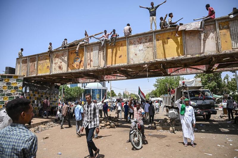 Sudanese protesters gather during a sit-in outside the army headquarters in the capital Khartoum on April 28, 2019. AFP