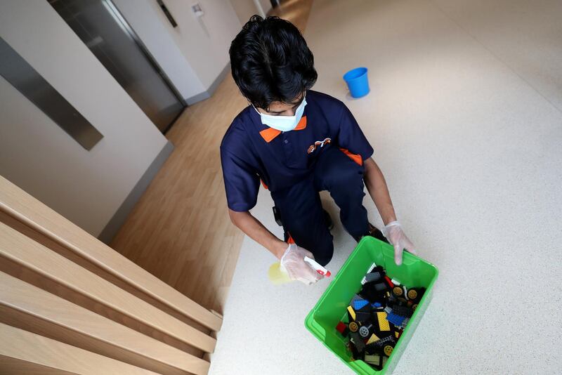 Dubai, United Arab Emirates - Reporter: N/A. News. Health. Covid-19/Coronavirus. Rajendra cleans the lego at OliOli. Children are given a bucket to use and then are cleaned before the next child can use them. Wednesday, July 29th, 2020. Dubai. Chris Whiteoak / The National
