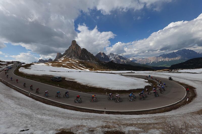 Cyclists head down the Giau Pass in the Dolomites mountains during the 19th stage of the Giro d'Italia race, 183km between Longarone and Tre Cime di Lavaredo. AFP