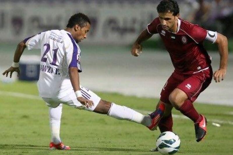 Tawfeeq Al Hosani, right, and his Al Wahda teammates have been told not to have a letdown against Dubai, a team that always seems to play their best against Wahda.