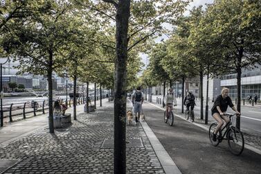 Commuters cycle along a designated bike path along the River Liffey, in Dublin, Ireland. The country recorded the highest growth in employment levels in the eurozone in the third quarter compared to the previous three months with a rise of 3.3 per cent. Getty Images