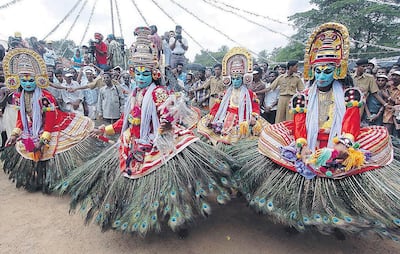 Artists perform a traditional dance during the start of the 10-day-long Onam festival in Kochi, in the southern Indian state of Kerala. AP