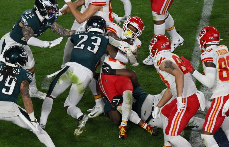 Philadelphia Eagles' safety CJ Gardner-Johnson tackles Kansas City Chiefs' running back Isiah Pacheco during Super Bowl LVII. AFP