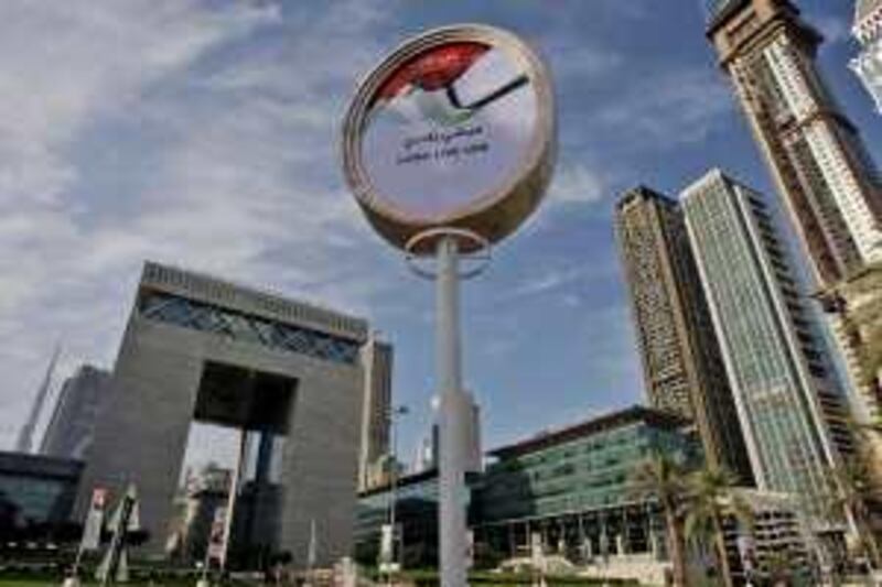 The Gate building, left, of Dubai International Financial Center, DIFC, remains closed today due to Eid al-Adha holidays in Dubai, United Arab Emirates, Saturday, Nov. 28, 2009. European stock markets rebounded Friday after Wall Street didn't fall as much as feared on the news that Dubai is having trouble handling its debt. (AP Photo/Kamran Jebreili) *** Local Caption ***  XKJ104_Dubai_Debt_Fallout.jpg