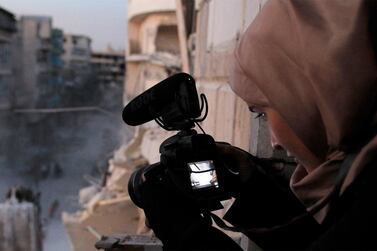 Waad al-Kateab films the ruins of a building destroyed by bombing in besieged east Aleppo in the documentary 'For Sama'. AP