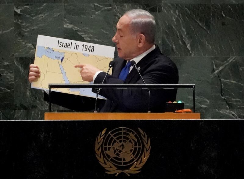 Israeli Prime Minister Benjamin Netanyahu holds up a map of Israel that includes all of the West Bank and Gaza during his UN address in 2022. AFP