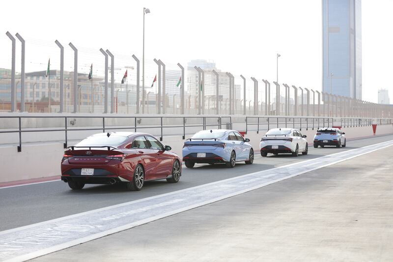 A convoy heads out of the pit lane.