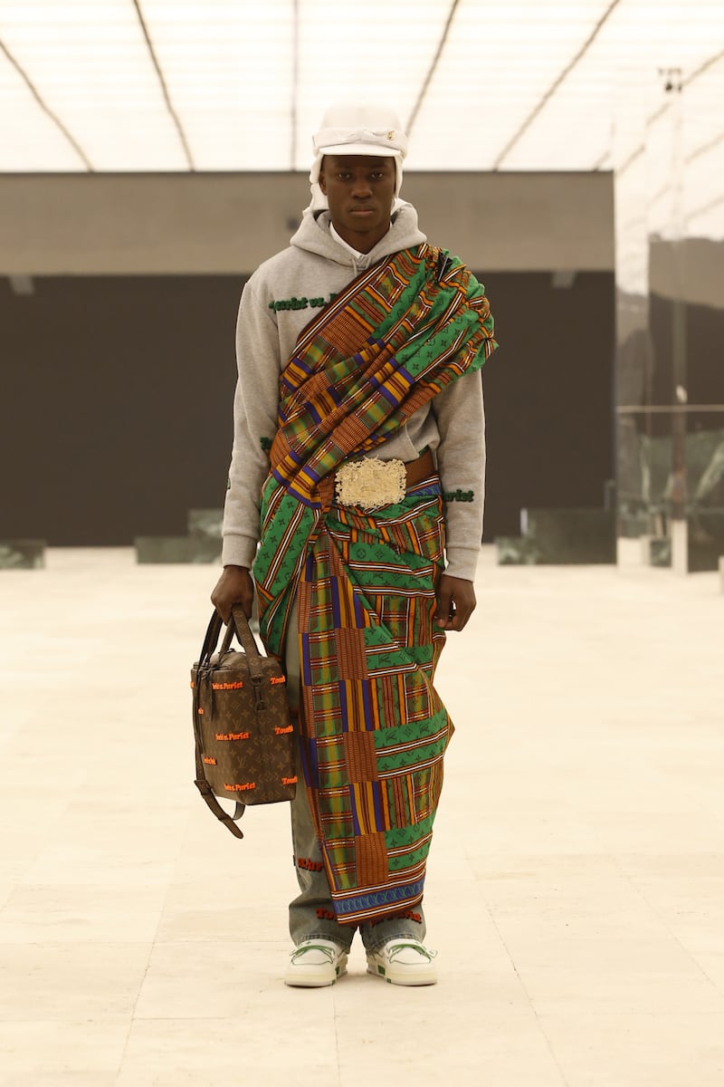 A model is wrapped in a kente cloth, as part of the autumn/winter 2021 collection by Virgil Abloh at Louis Vuitton. Photo: Louis Vuitton