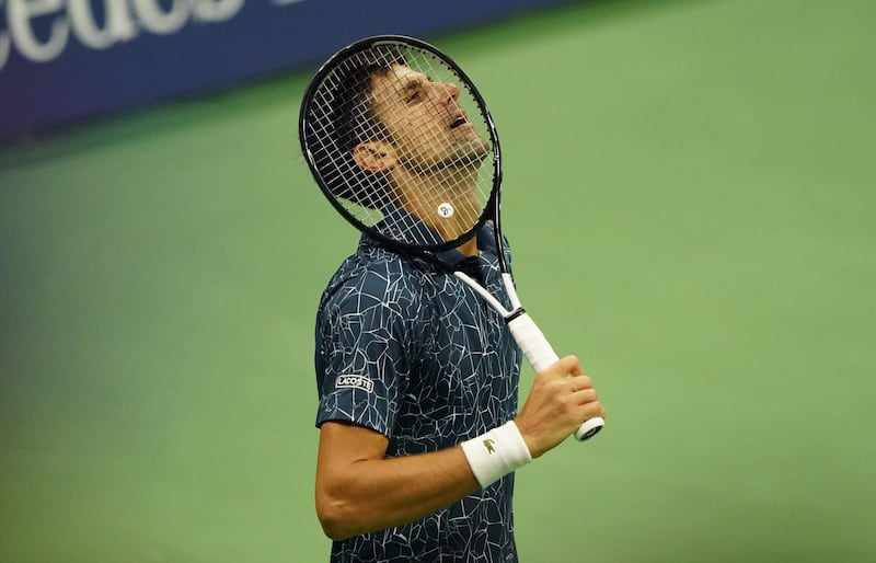 Novak Djokovic of Serbia pauses while playing Juan Martin del Potro of Argentina during their 2018 US Open men's singles final match on September 9, 2018 in New York. (Photo by kena betancur / AFP)