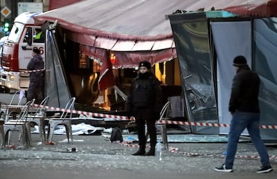 Investigators and members of emergency services attend an explosion at a cafe in Saint Petersburg on April 2. EPA