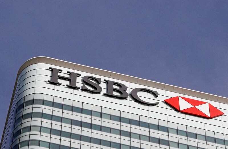 The HSBC bank logo at its Canary Wharf head office in London. The lender is expanding its Asia-focused wealth business. Reuters
