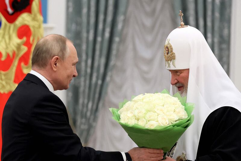 Patriarch Kirill of Moscow (R) is a staunch supporter of Russian President Vladimir Putin. AFP