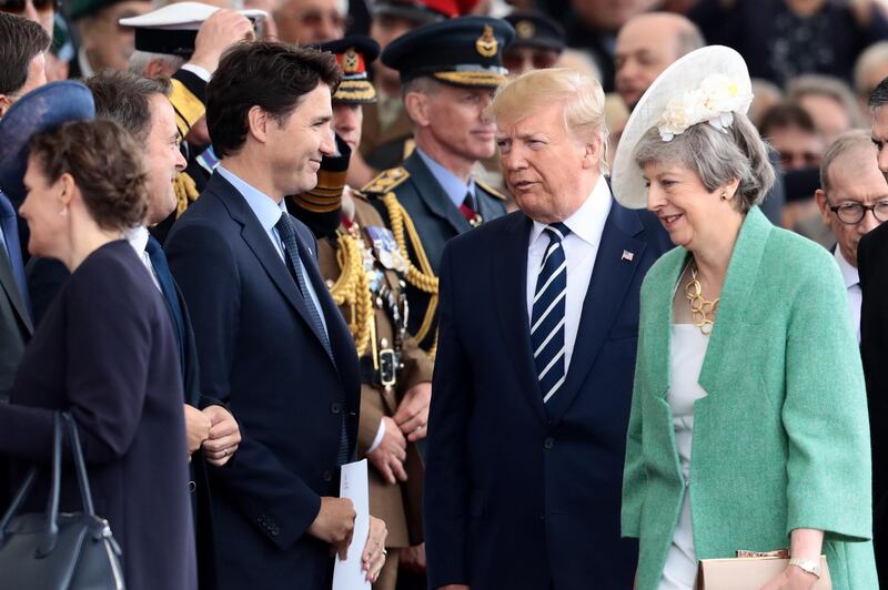 Donald Trump, Theresa May and Canadian prime minister Justin Trudeau. Getty