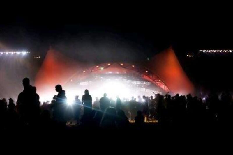 People gather for a concert at the Roskilde festival in Denmark. Torben Christensen / Scanpix / AFP