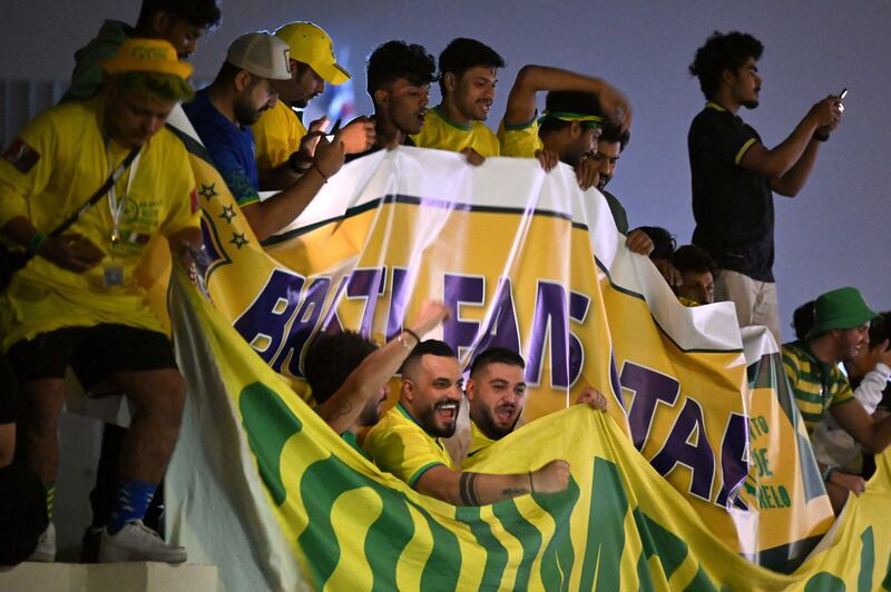 Brazil fans gather outside the Westin Doha Hotel & Spa in Doha to welcome their team to Qatar. AFP