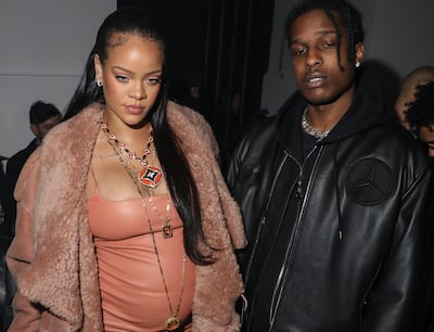 Rihanna and ASAP Rocky arrive for the Off-White ready-to-wear autumn/winter 2022-2023 show. AP