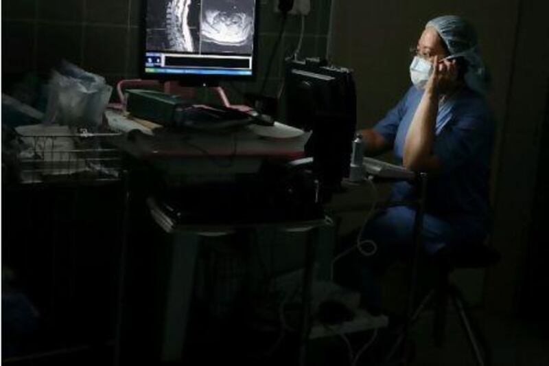 A nurse monitors a patient at Tawam Hospital in Al Ain. Companies are now looking for a different set of skills as they try to fill vacancies with medical personnel, engineers and other professionals.