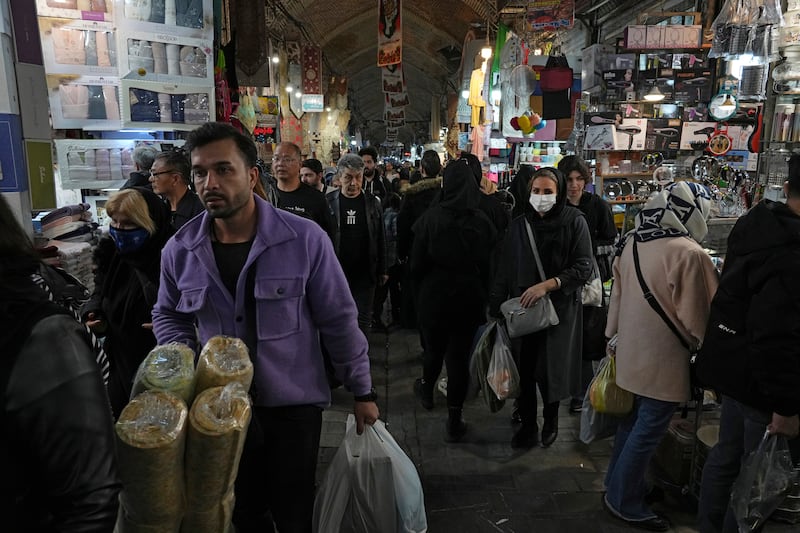 Iranians at the old grand bazaar in Tehran. AP Photo