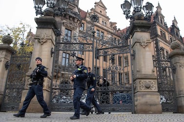 Police leaving the Residenzschloss Royal Palace that houses the historic Green Vault in Dresden, east Germany. DPA