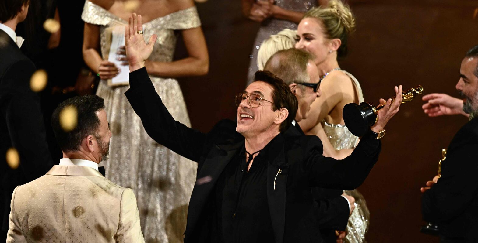 Robert Downey Jr reacts onstage after Oppenheimer won the award for Best Picture. AFP