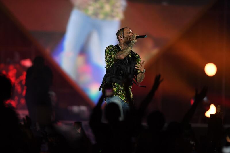 Chris Brown performs on stage. AFP