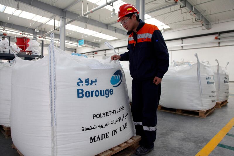 An employee walks through the storage facility at the Borouge Compounding Shanghai facility on the outskirts of Shanghai, China on 22 December 2010.  Qilai Shen for the National