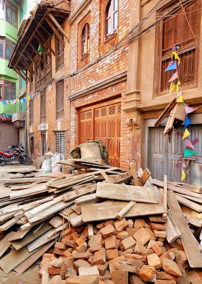 A restored building, with debris ready to be recycled. Photo by Devak Menon