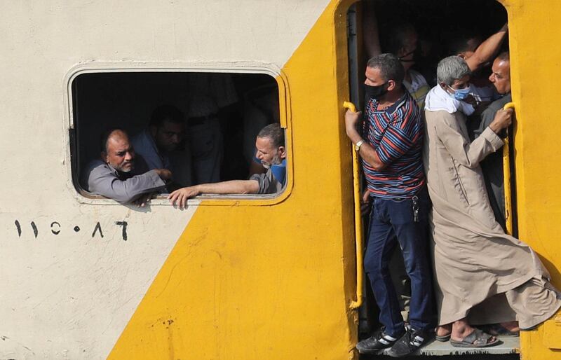 People travel on an overcrowded train, following the outbreak of the coronavirus disease in Cairo, Egypt. Reuters