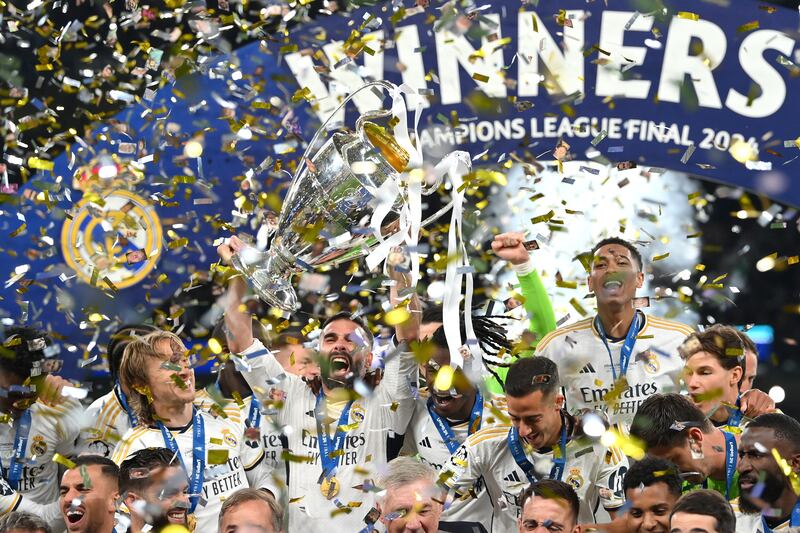 Real Madrid players begin the trophy celebrations after winning the Champions League. Getty Images