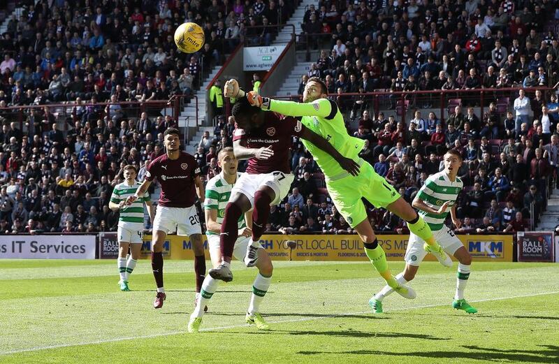 Esmael Goncalves of Hearts is challenged by with Celtic goalkeeper Craig Gordon. Ian MacNicol / Getty Images