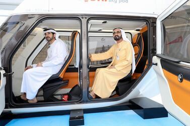 Sheikh Mohammed bin Rashid, Vice President and Ruler of Dubai, and Sheikh Hamdan bin Mohammed, Crown Prince of Dubai, review prototypes of sky pod technology. Courtesy: Wam    