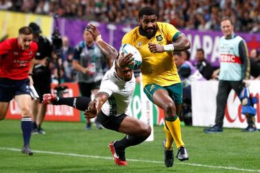 Australia's Marika Koroibete, who was born in Fiji, scores the Wallabies sixth try during Saturday's 39-21 victory over Fiji in their opening match at the Rugby World Cup 2019. Reuters