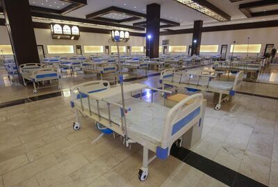 A picture taken on June 21, 2020, shows a general view of a 525-bed field hospital being built by the Iraqi Aqiq Institution for Charity at the Baghdad International Fair exhibition center in the capital Baghdad, as part of the efforts to curb the spread of the COVID-19 pandemic. Iraq has registered more than 45,000 coronavirus cases, with doctors increasingly infected. In the semi-autonomous Kurdish north, a recent surge in coronavirus infections has pushed infected cases there over 5,000 -- including at least 200 health workers -- and the deaths to more than 160.  / AFP / AHMAD AL-RUBAYE
