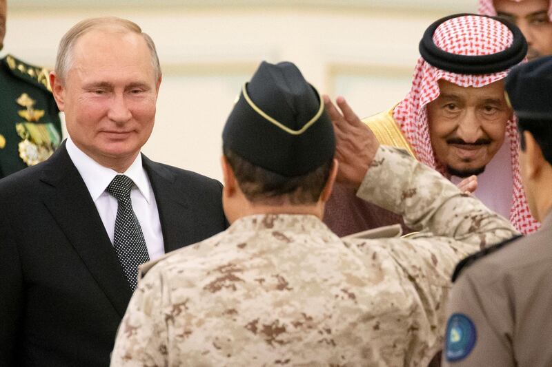 Mr. Putin and King Salman attend the official welcome ceremony in Riyadh. Reuters