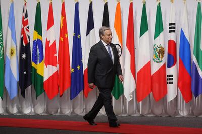 UN General Secretary Antonio Guterres arrives for the family photo at the G20 Osaka Summit in Osaka on June 28, 2019.  / AFP / Ludovic MARIN
