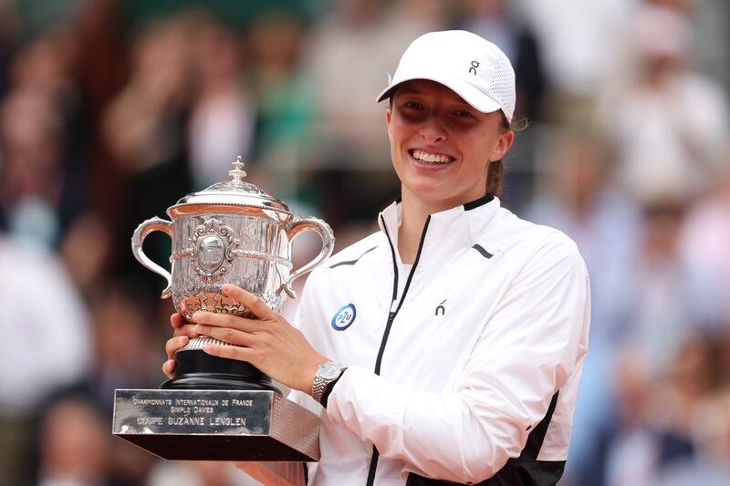 Iga Swiatek with the French Open trophy after her win over Karolina Muchova in the final. Getty