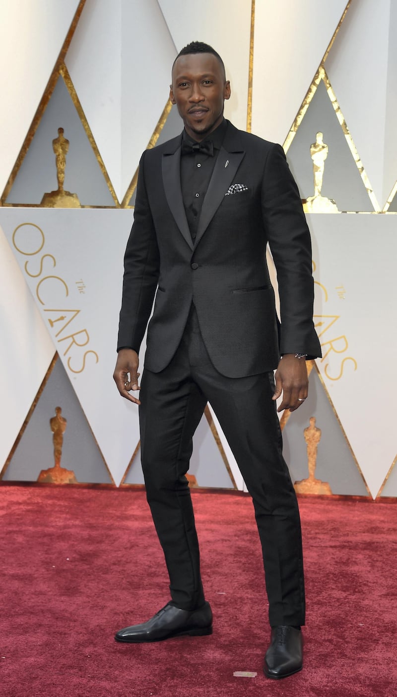 Nominee for Best Supporting Actor "Moonlight" Mahershala Ali arrives on the red carpet for the 89th Oscars on February 26, 2017 in Hollywood, California. (Photo by VALERIE MACON / AFP)