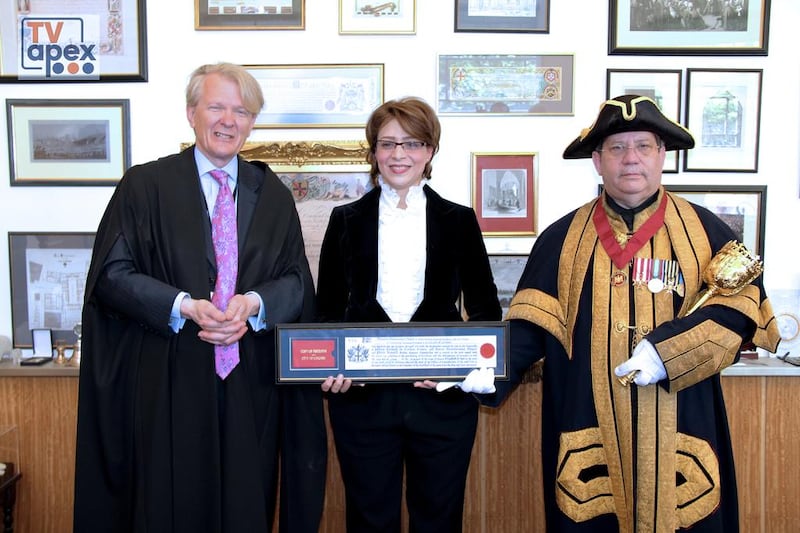 Murray Craig, the clerk of the Chamberlain’s Court at City Corporation of London, with the Yemeni scientist and UAE resident Manahel Thabet and, right, Professor Frederick Trowman-Rose, the Ward Beadle of Bassishaw of the City of London, during Ms Thabet’s Freedom of the City of London presentation at the City of London Guildhall. Courtesy Clerk of the Chamberlain’s Court